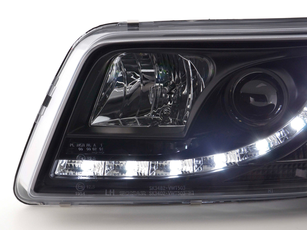 Scheinwerfer Set Daylight LED TFL-Optik VW Bus Typ T5 03-09 schwarz Scheinwerfer Set Daylight LED TFL-Optik VW Bus Typ T5 03-09 schwarz
